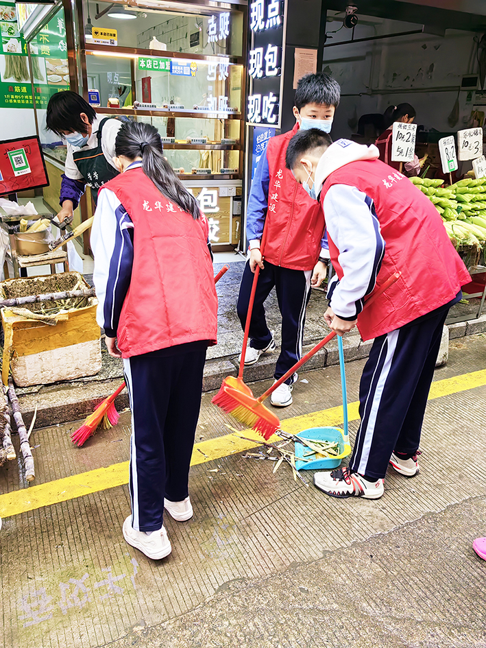 校企共建 一场别开生面的创文志愿活动在华富市场开展 校企共建 一场别开生面的创文志愿活动在华富市场开展